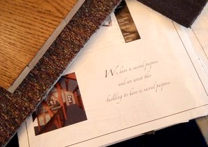 Campaign booklet showing original stained glass image with materials for interior design choices, taken at the studio while working on the new stained glass design.